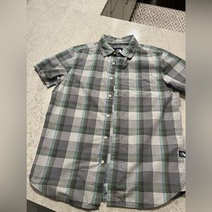 The North Face cotton short leaves button up shirt. Like new only worn once.